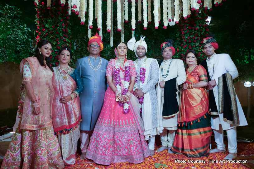 Family Posing for a picture after the ceremony