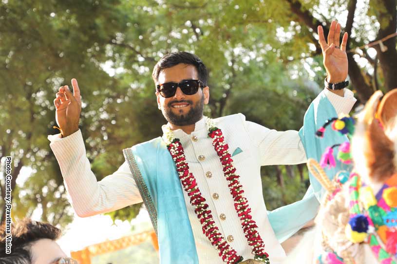 Indian Groom Sitting On a horse at the baraat