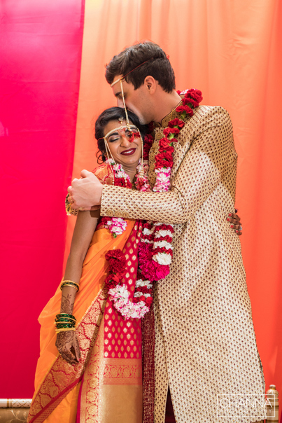 Groom Hold Tightly Bride and kissing on her head