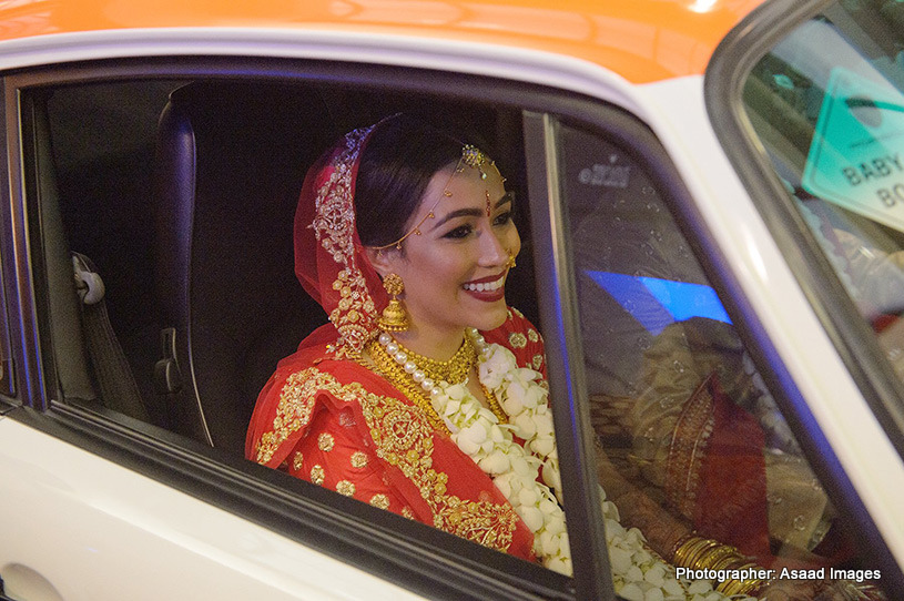 Indian Bride riding in an attractive car