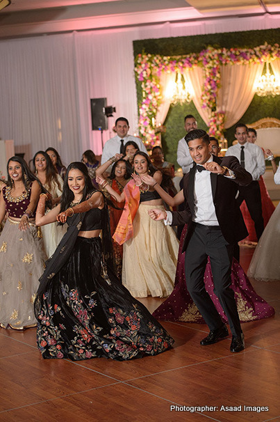 Gorgeous Indian Couple dancing at reception