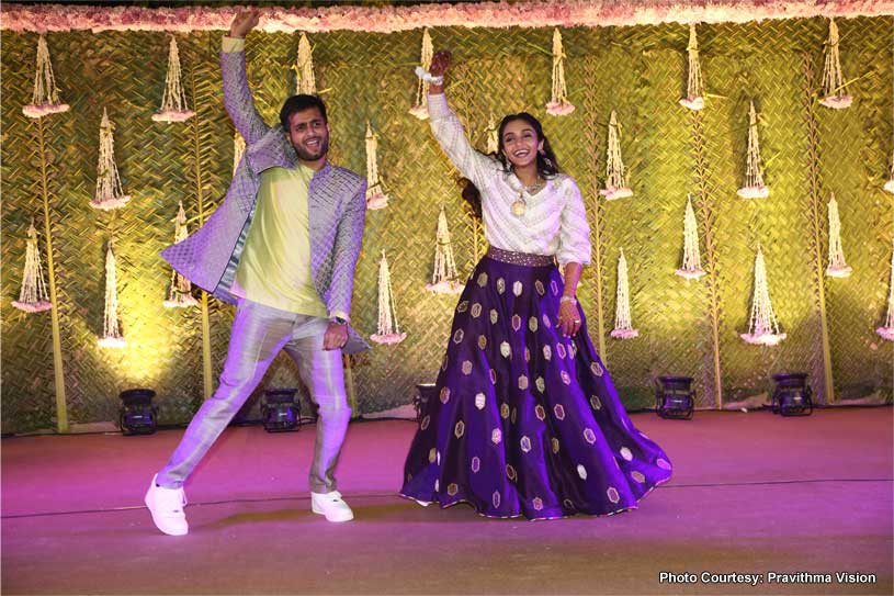 Indian Couple Dancing at the sangeet ceremony