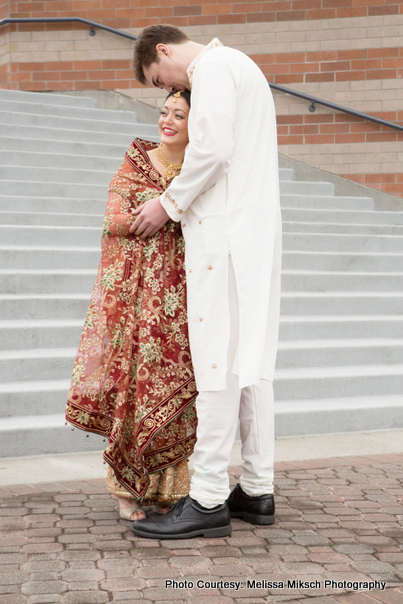 Groom Kissing to Indian Bride 