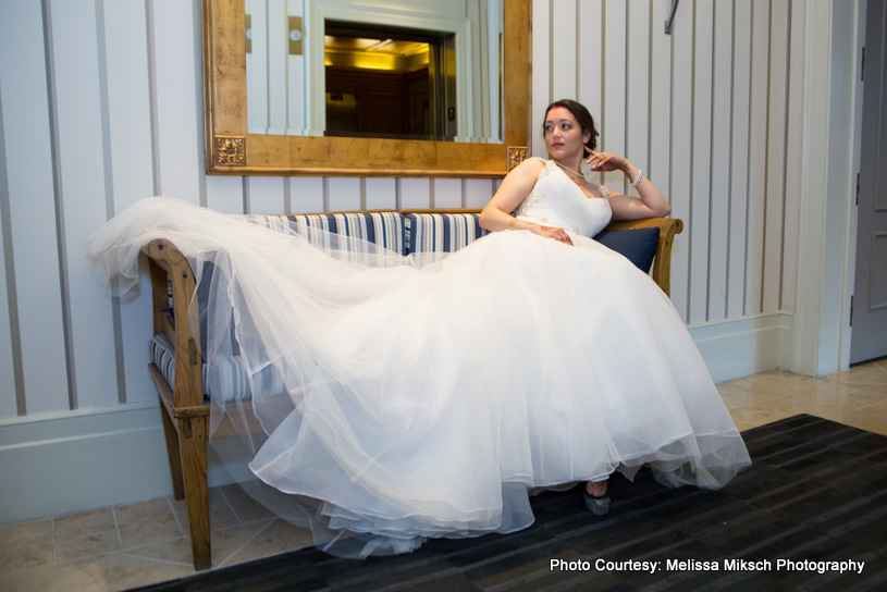 Indian Bride wearing white wedding gown