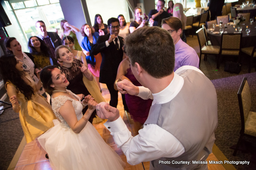 Wedding Couple dancing with wedding guest