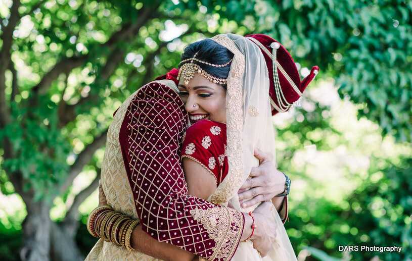 Tight hug by Indian Groom