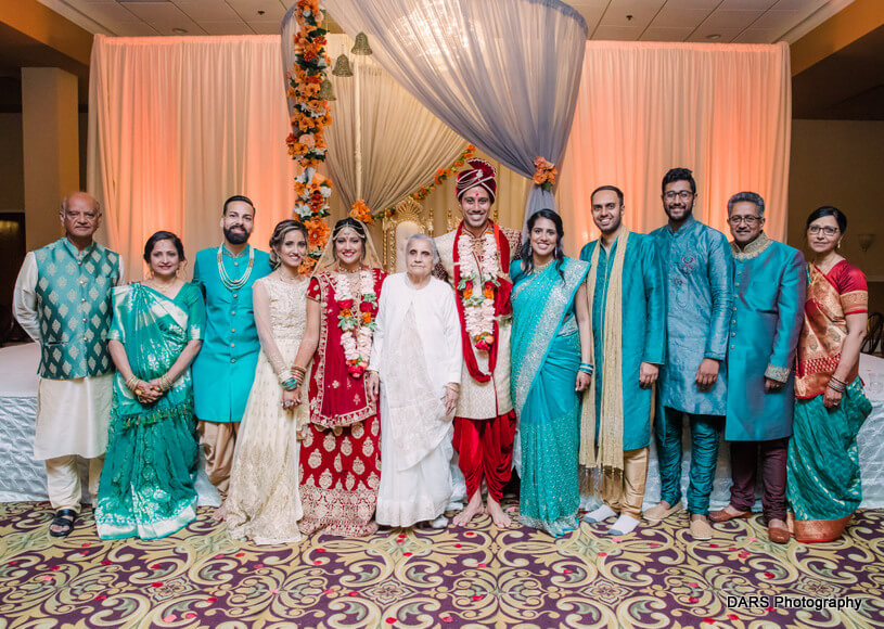 Indian Couple Posing With Family