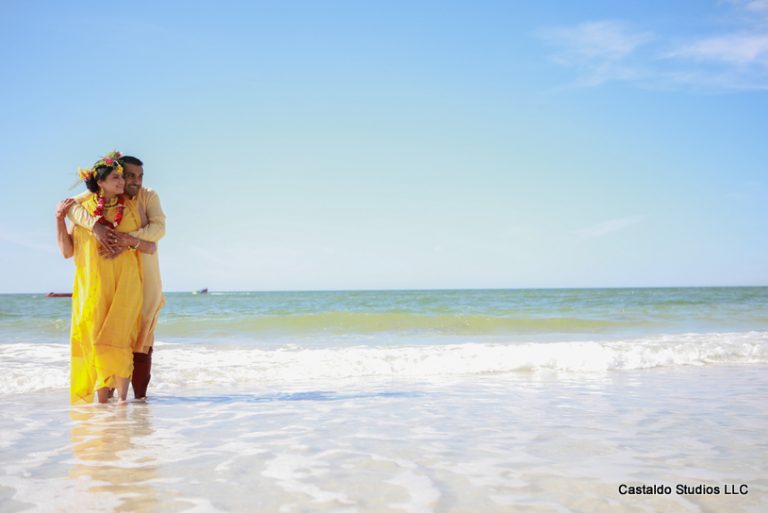 Gorgeous Pose by indian Couple in Haldi Outfit