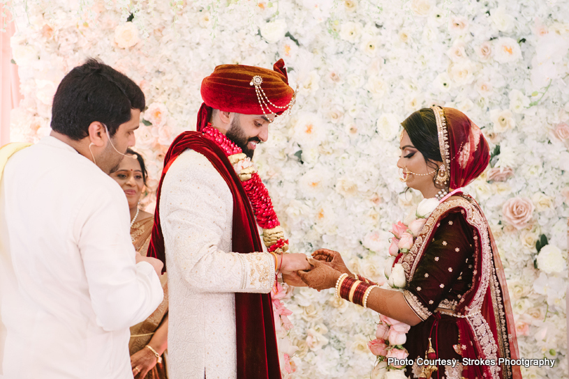 Bride wears ring to the groom