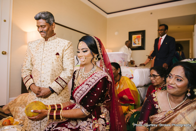 Indian Bride holding coconut in hands