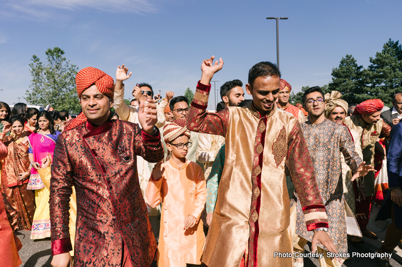 Friends and family Dancing at the Wedding Baraat