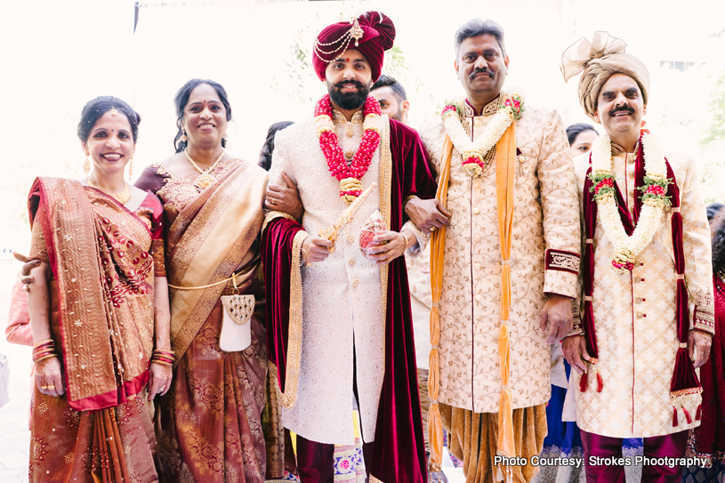 Indian groom entering wedding hall