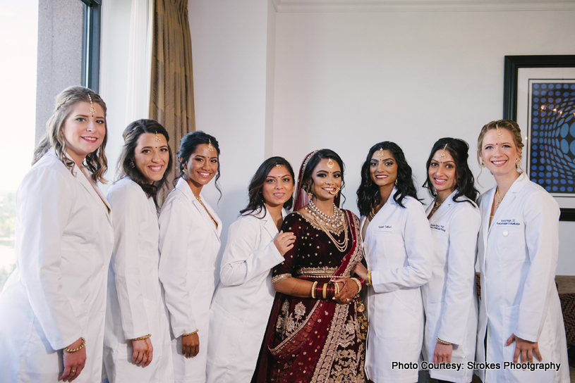 Indian bride posing with her friends
