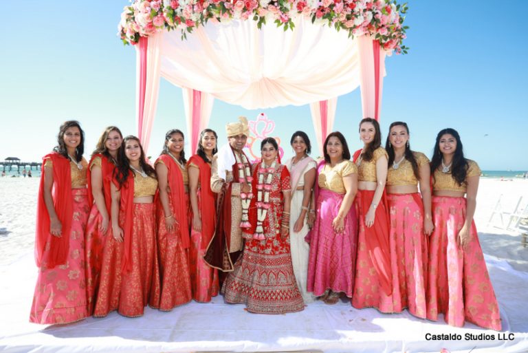 Indian Couple Posing With Bridesmaids