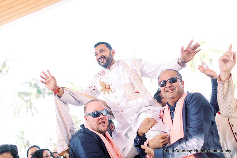 Friends carrying indian groom at the Wedding venue