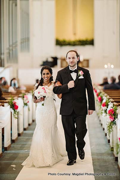 Couple entering the wedding Venue