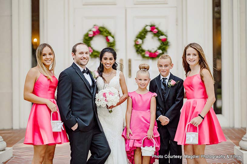 Couple posing with friends