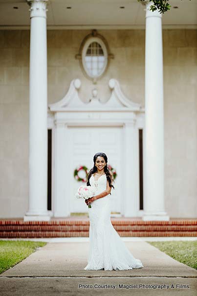 Indian Bride Holding flowers in hands