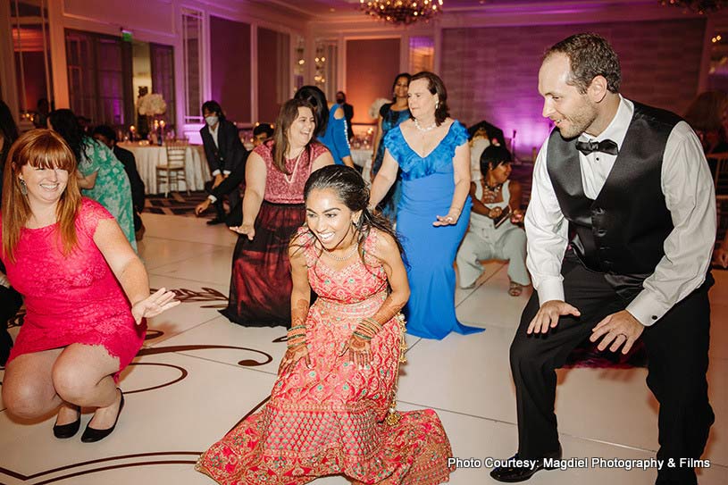 Couple having fun at wedding party