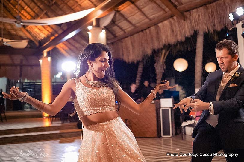 Couple dancing at the Sangeet