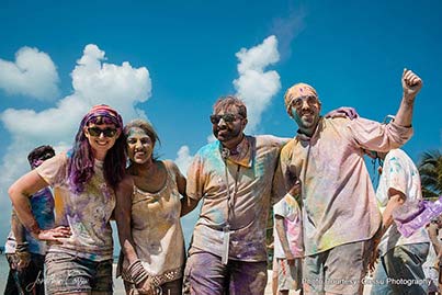 Friends Having fun at Holi party