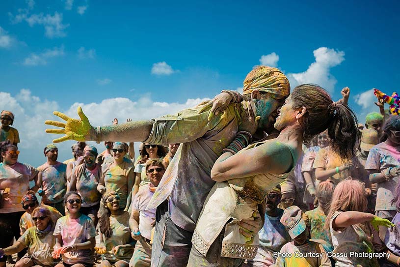 Couple dancing at Holi Party