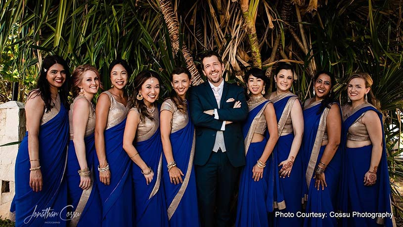 Groom Posing with Bridesmaids