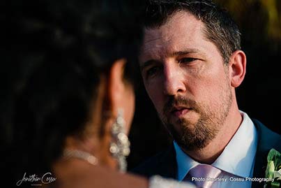 Groom looking in bride's Eyes