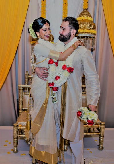 Groom and Bride having fun at wedding 