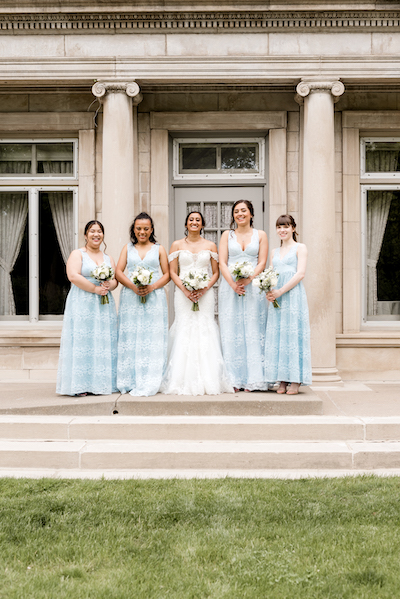 Indian bride and bridesmaid with wedding bouquet