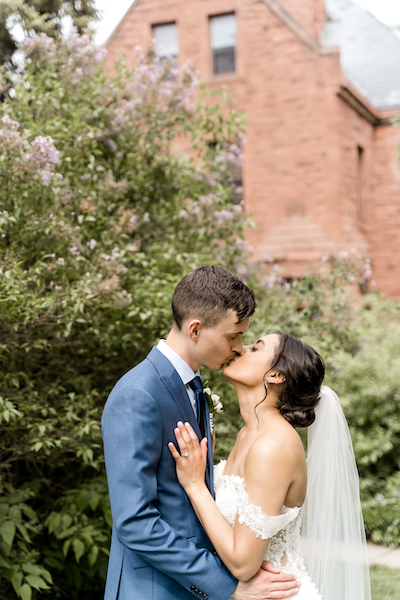 Wedding couple kissing to eachother