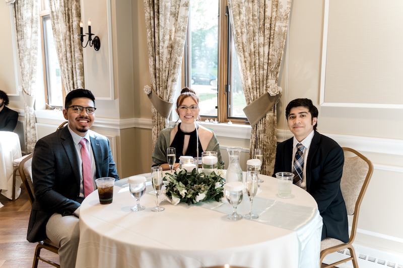 Indian wedding guest looking at Indian Couple