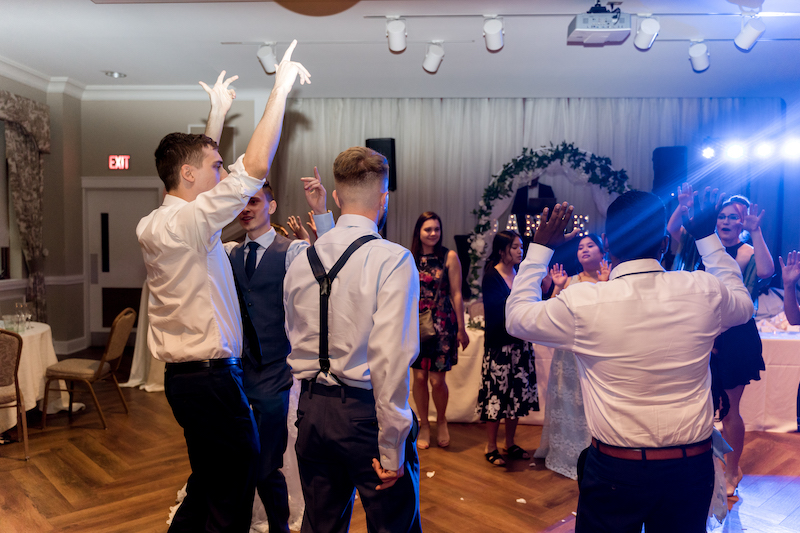 Fusion wedding guest enjoying dj Party