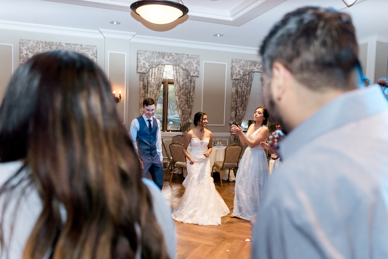 Fusion wedding couple performing their dance in reception ceremony