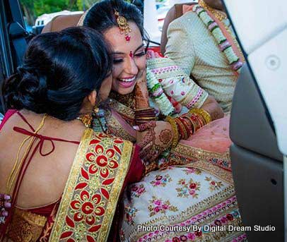 Mom giving her blessing to this lovely indian bride