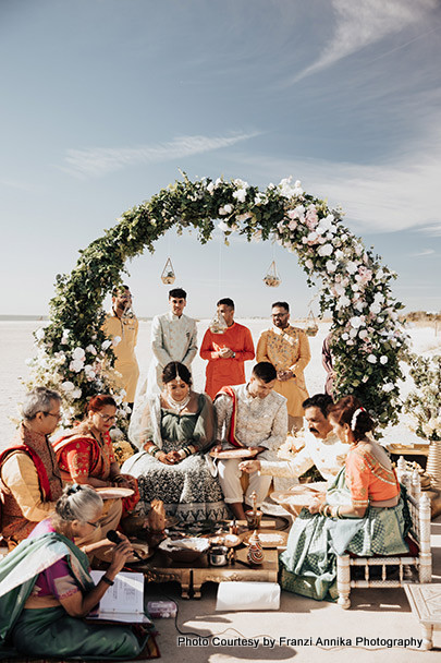 Indian bride and groom Under wedding mandap