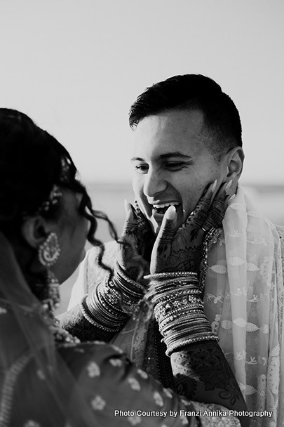 Indian bride and Groom staring with love