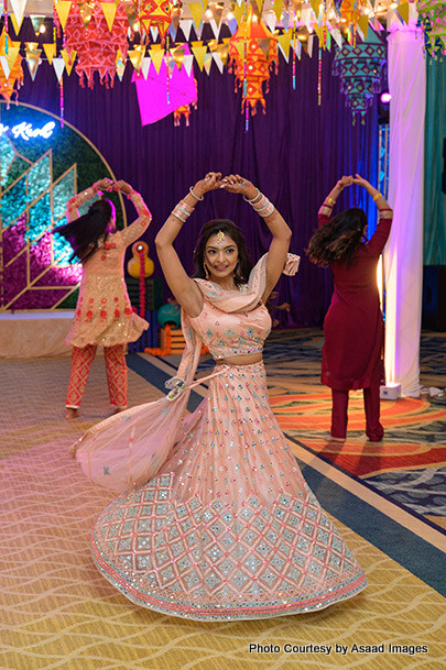 Indian bride giving dance performance with their friends