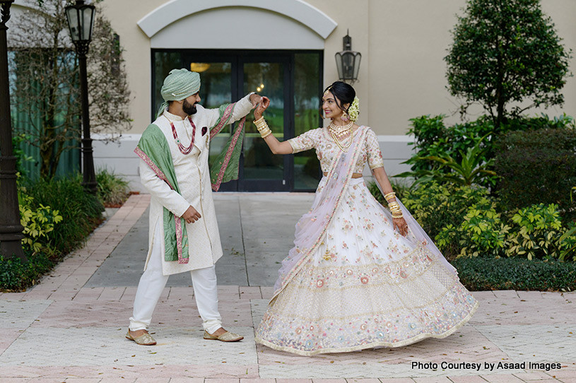 Indian wedding couple possing for outdoor photoshoot