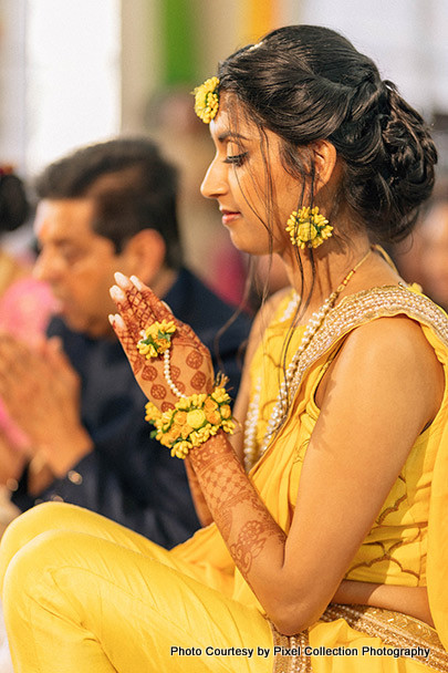Indian bride Getting blessings from lord ganesha