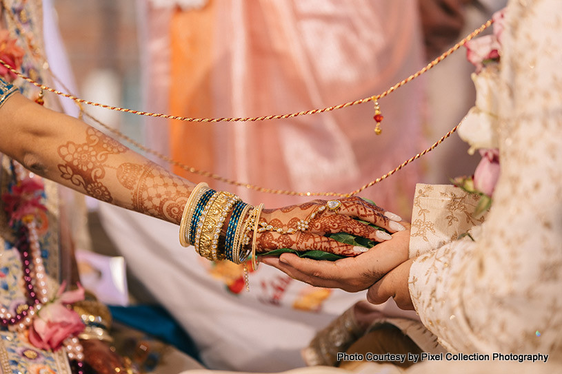 Indian Wedding Groom and Bride Holding Hands Traditions -Hastmelap