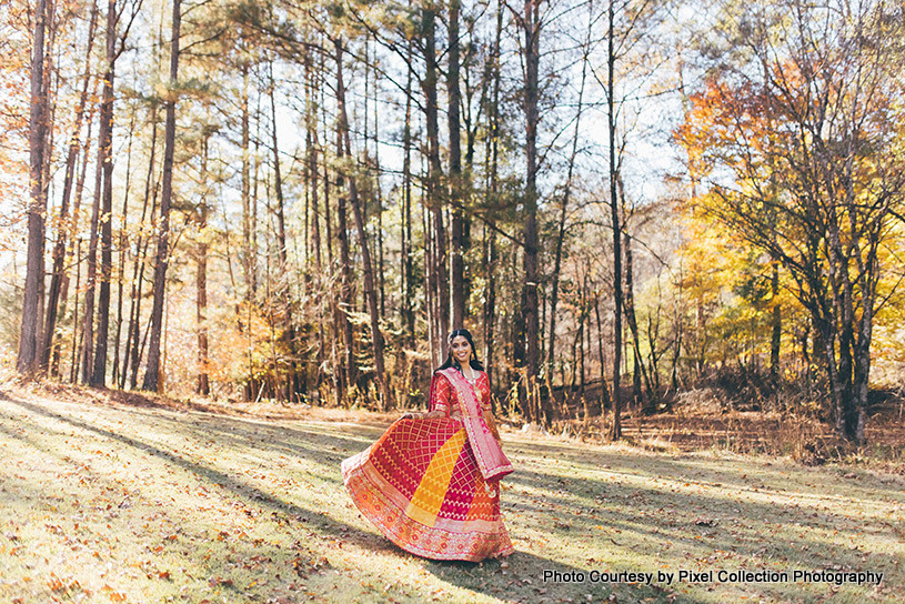 Indian Bride twirling in her garba attire