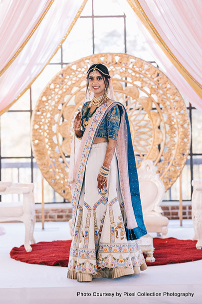 Indian Bride under wedding mandap