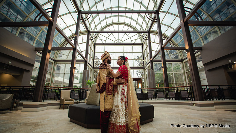 Indian wedding couple possing for outdoor photoshoot