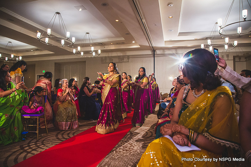 Indian bride entry with bridesmaid