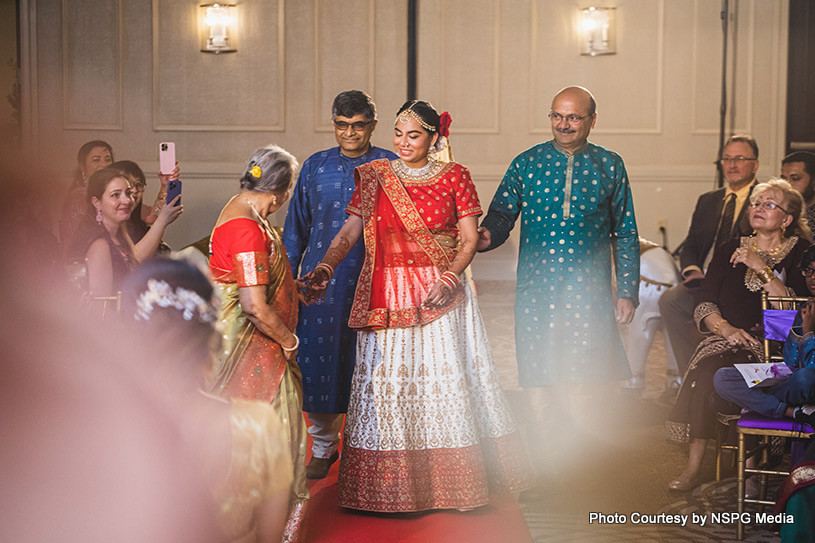 Indian Bride Holding her Realtives hand