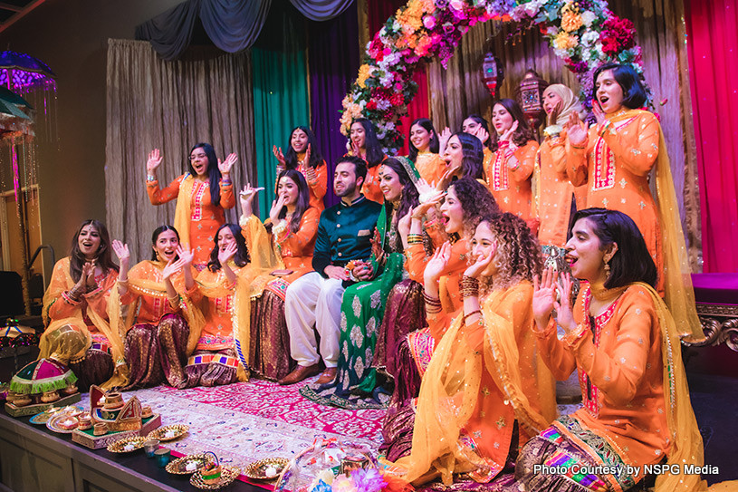 Happy Indian Wedding Couple Posing with Bride Friends