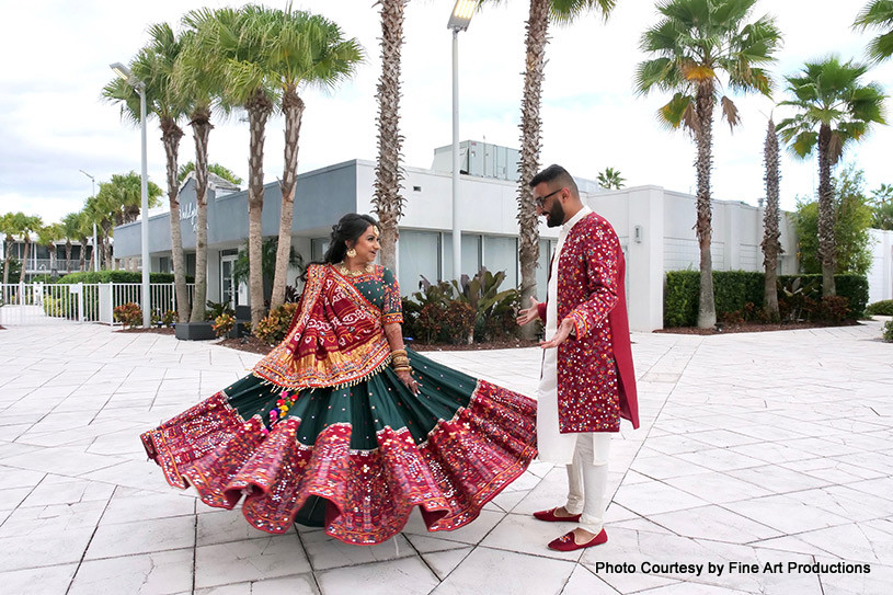 Indian wedding couple possing for outdoor photoshoot