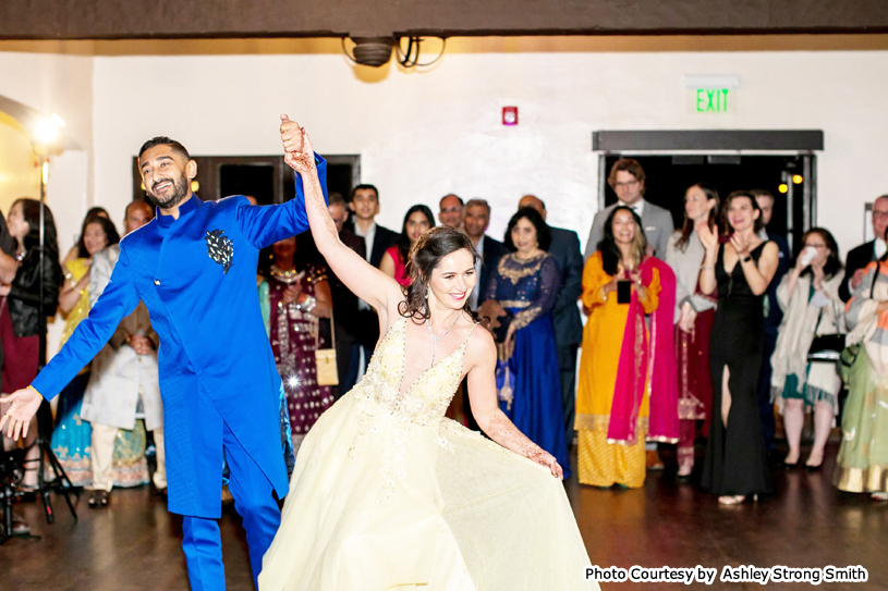 Indian bride and groom enjoying on dance floor