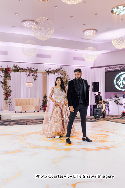 Indian bride and groom enjoying on dance floor
